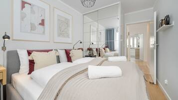 1 bedroom, desk, bed sheets