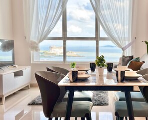 Classic Apartment, 2 Bedrooms, Kitchen, Sea View | Dining room - Amber Cove Impression City Heystay (Malacca City)