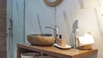 Shower, hair dryer, towels, soap