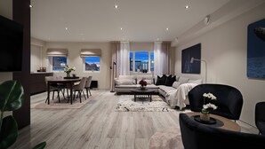 A modern living room with a dining area, a sofa set, and a coffee table.