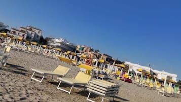 Sun-loungers, beach towels