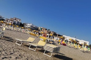 Sun-loungers, beach towels
