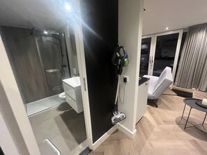 Shower, hair dryer, towels, soap