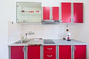 Apartment, Sea View | Private kitchen | Stovetop, coffee/tea maker, electric kettle, cookware/dishes/utensils