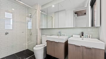 Shower, hair dryer, towels, soap