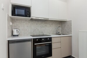 Apartment | Private kitchen | Fridge, oven, electric kettle, cookware/dishes/utensils - Stylish New Paradise for 2 in Marousi (Marousi)