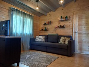 Comfort House | Living area | Flat-screen TV