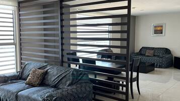 Comfort Suite | Living area | 42-inch Smart TV with cable channels