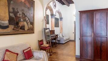 Superior Apartment | Living area | Flat-screen TV