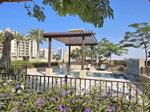 Outdoor pool, a heated pool - Stylish 1BR Apt Umm Suqeim 3 (Dubai)