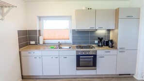 Fridge, oven, stovetop, coffee/tea maker
