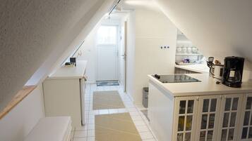 Fridge, stovetop, coffee/tea maker, toaster