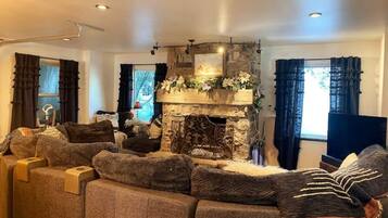 Smart TV, fireplace, books