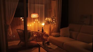 Deluxe Apartment | Living room | 42-inch TV with digital channels, heated floors