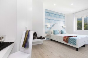 2 habitaciones, tabla de planchar con plancha, cuna de viaje y wifi 