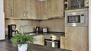 Réfrigérateur, micro-ondes, four, lave-vaisselle