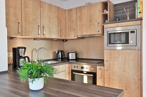 Réfrigérateur, micro-ondes, four, lave-vaisselle