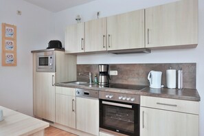 Refrigerador, microondas, horno y lavavajillas 