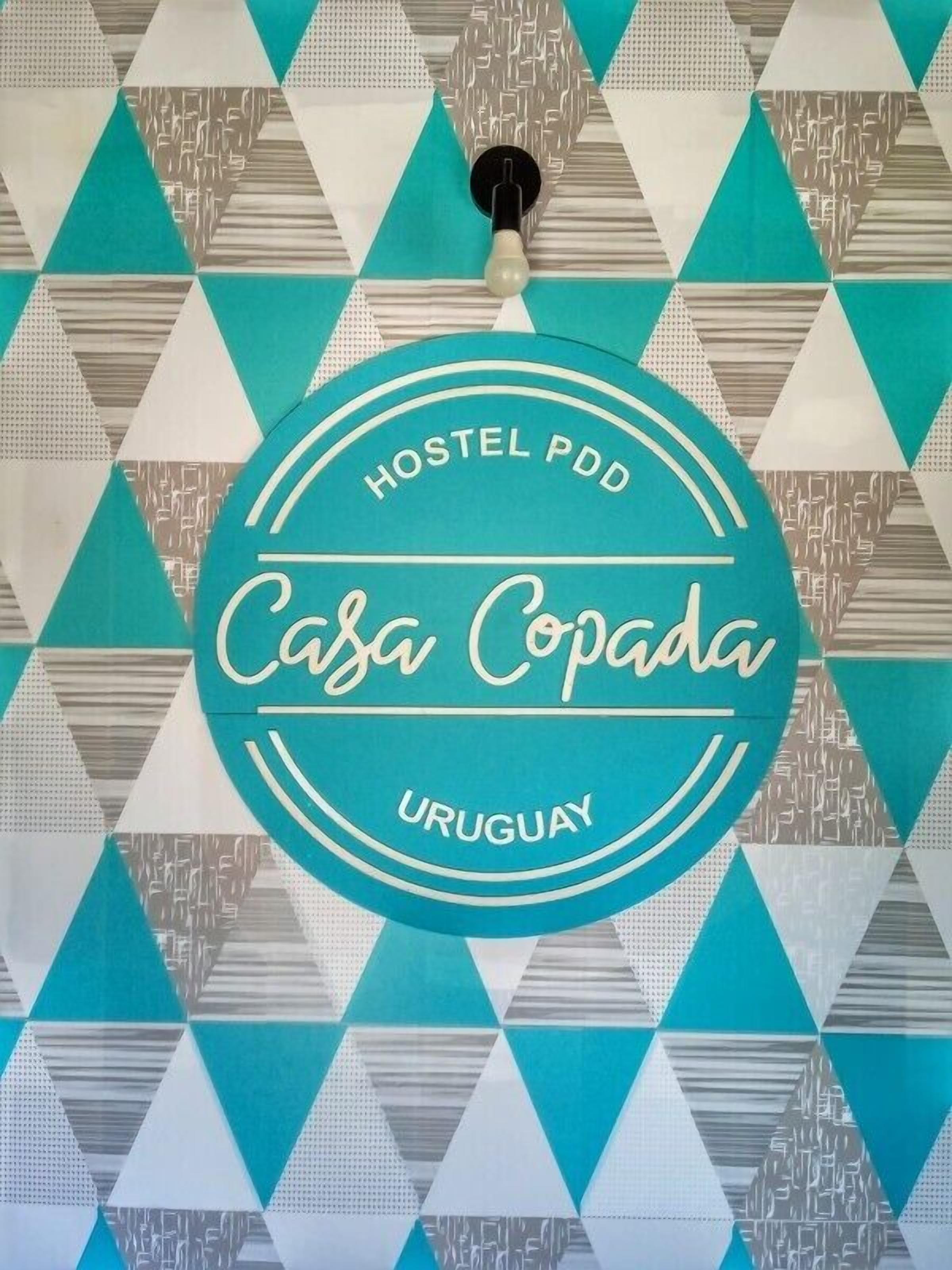 A Hostel PDD sign for Casa Copada, Uruguay.