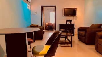 Premium bedding, desk, laptop workspace, free WiFi