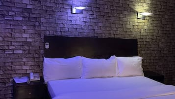 Premium bedding, desk, laptop workspace, free WiFi