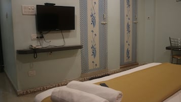 Standard Double Room | Living area | 22-inch LED TV with satellite channels