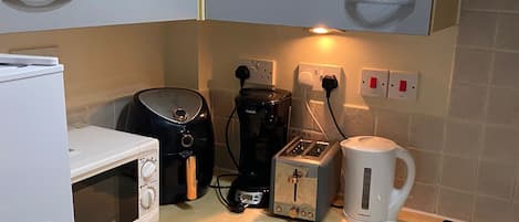 Appartamento | Cucina privata | Frigorifero, microonde, forno, piano cottura