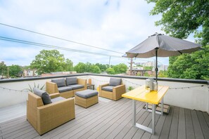 Outdoor dining - Affluent Rooftop Cityscape (Atlanta)