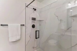 Shower, hair dryer, towels, soap