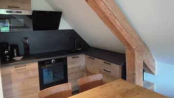 Fridge, microwave, toaster, cookware/dishes/utensils