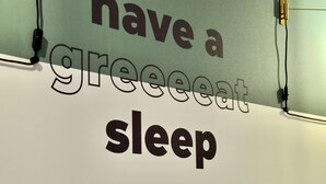 A bed with a wall-mounted sign that reads "have a great sleep." - Greet Hotel Brest Aéroport (Guipavas)