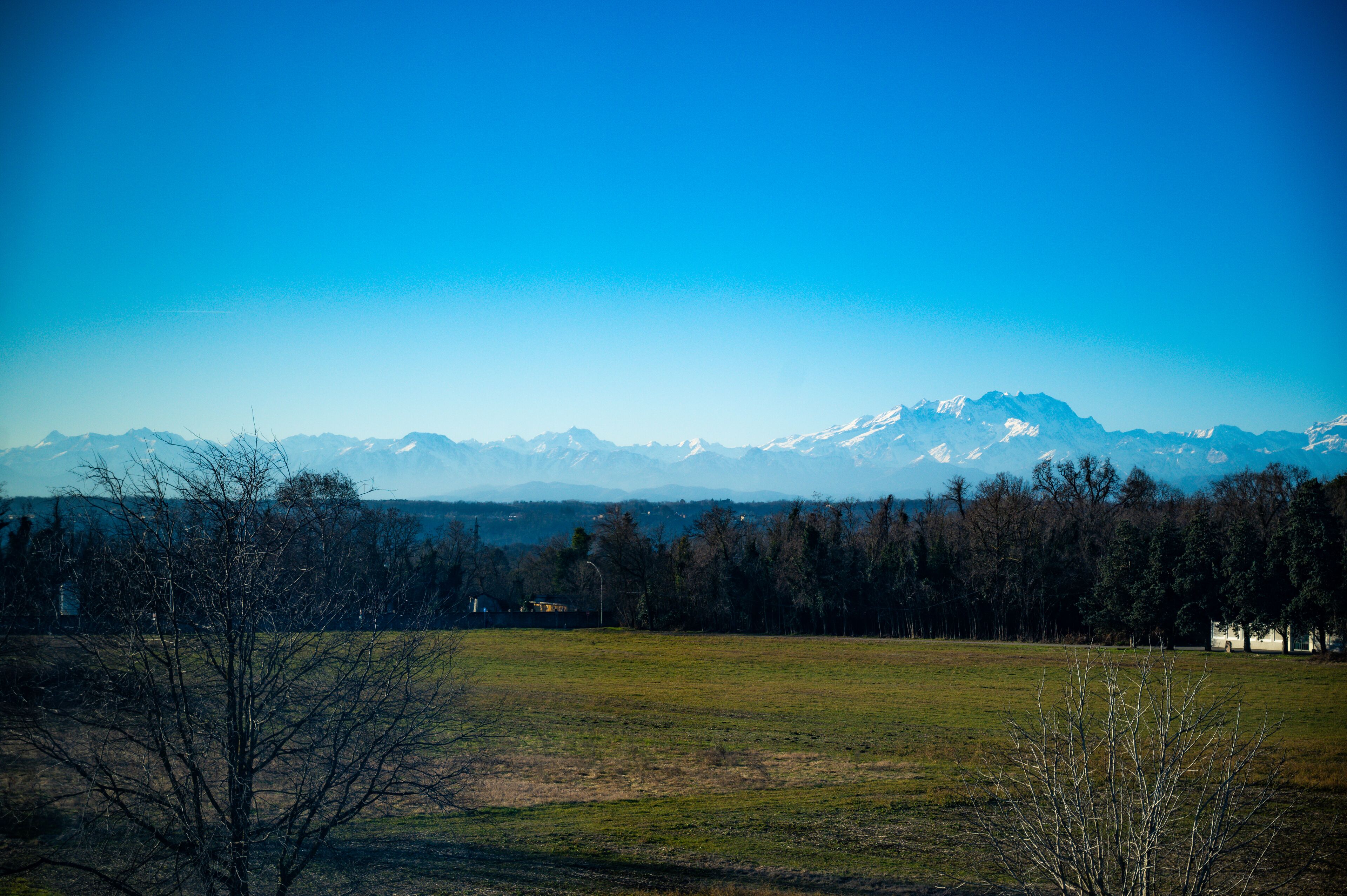 A mountain landscape with a clear sky.