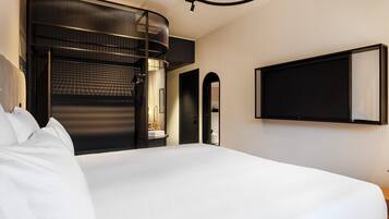 Premium bedding, down comforters, memory foam beds, minibar