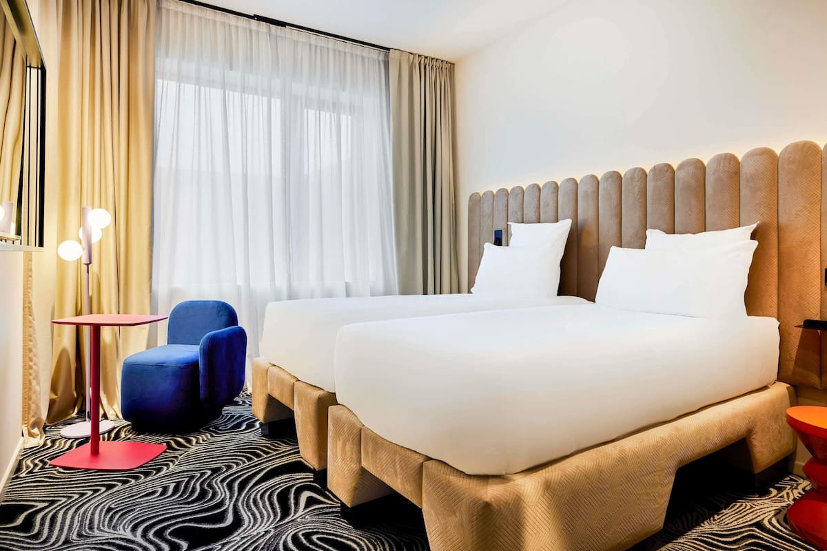 Premium bedding, down comforters, memory foam beds, minibar