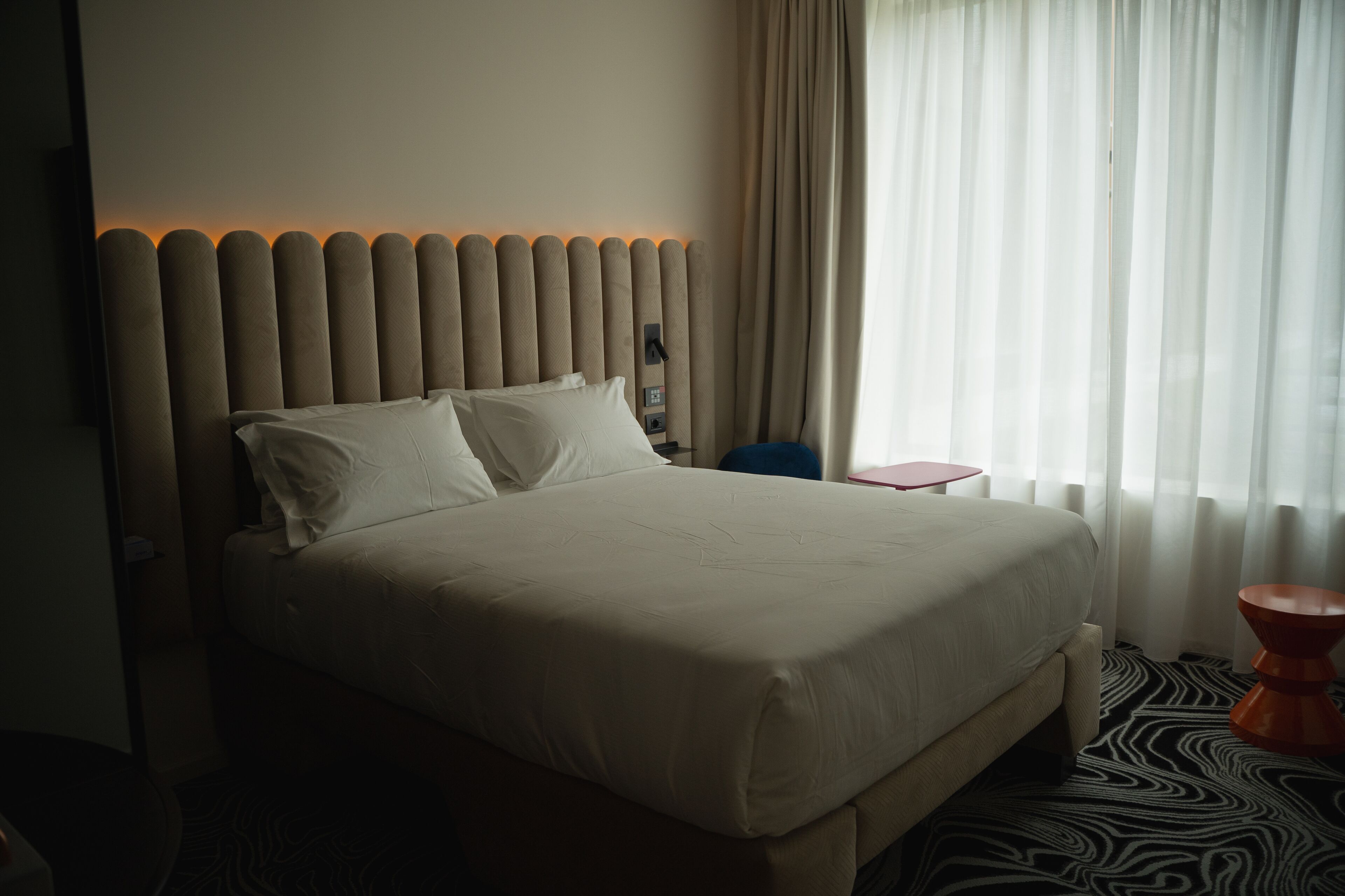 Premium bedding, down duvets, memory-foam beds, minibar