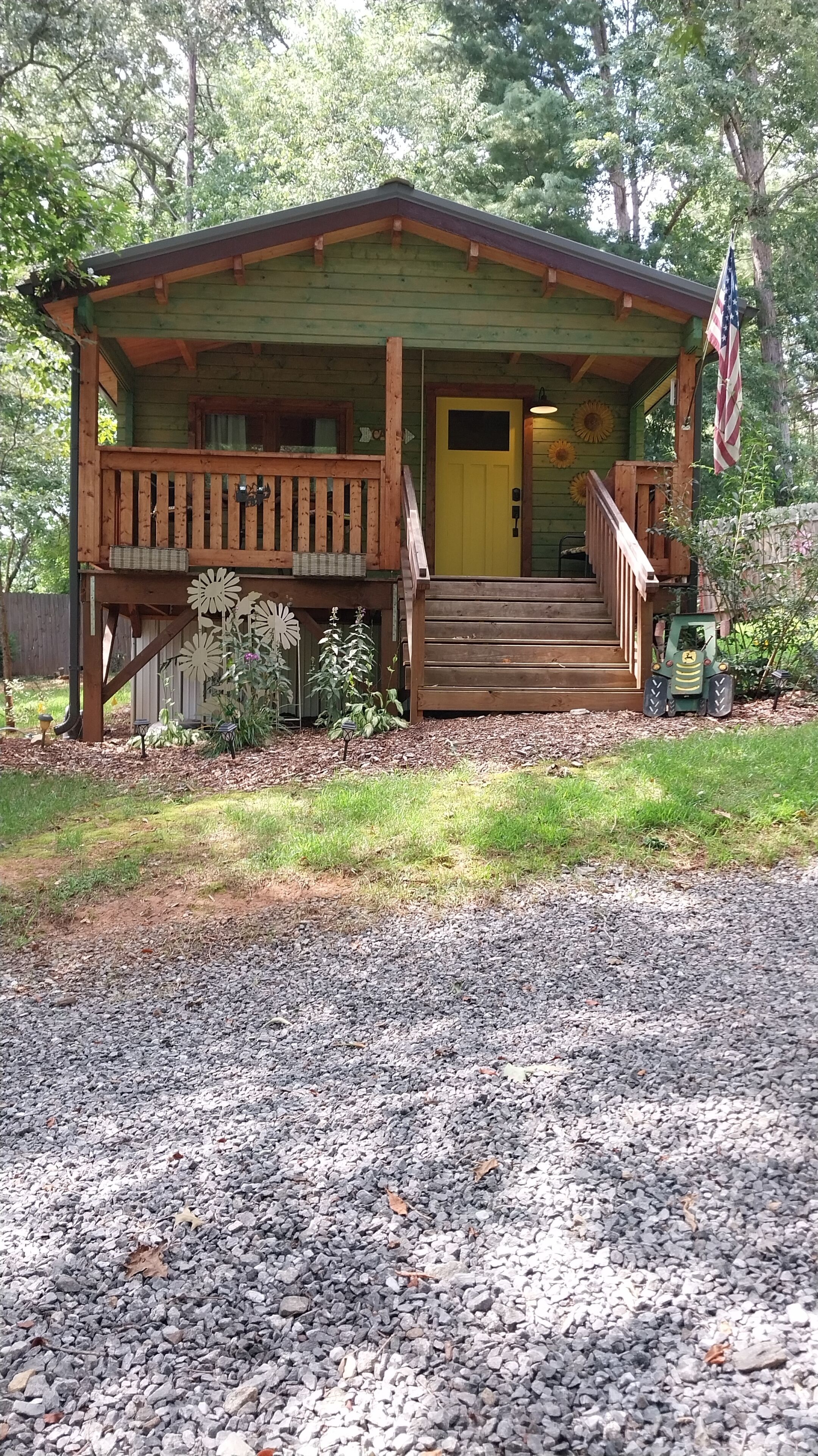 Cozy Smokies Tiny Home Cabin complete with a deck & mountain views.