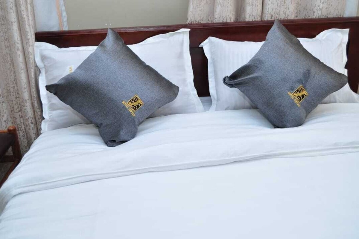 Economy Single Room, 1 Bedroom, Lake View | Frette Italian sheets, premium bedding, down comforters, desk