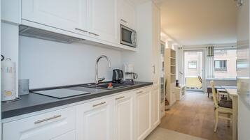 Fridge, microwave, coffee/tea maker, toaster