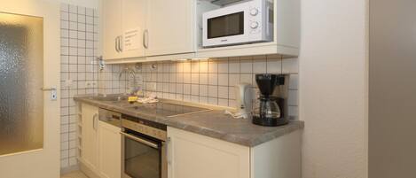 Fridge, microwave, coffee/tea maker, toaster