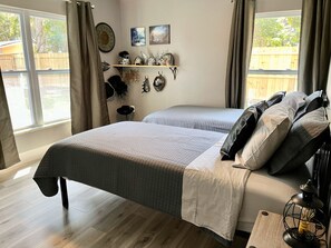 4 bedrooms, desk, iron/ironing board, travel cot