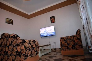24-inch Smart TV with digital channels - Lux Suites Mara Holiday Homes (Narok)