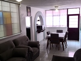 Business Apartment | Living area | Flat-screen TV