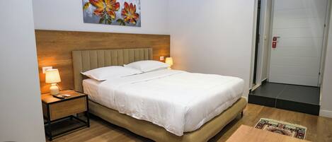 Deluxe Double Room | Memory-foam beds, minibar, individually decorated, desk