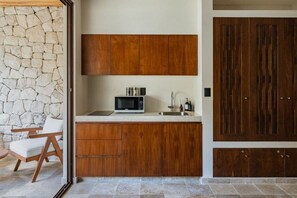 Fridge, microwave, stovetop, coffee/tea maker