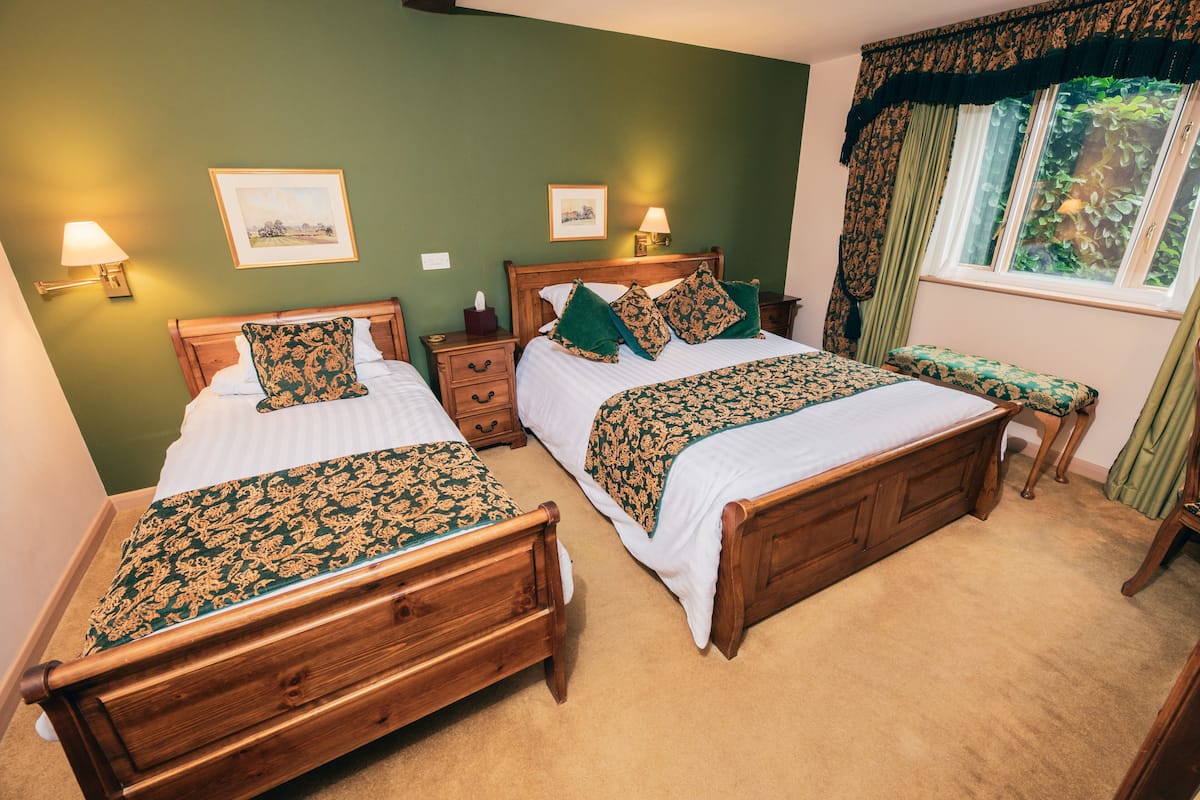 Family Double Room | Desk, blackout drapes, iron/ironing board (on request), WiFi (free)