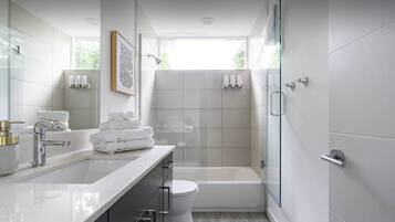 Shower, hair dryer, towels, soap