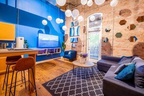 TV, offices - 100 Year-Old Historic Brick 2BR Loft -Large Patio1 (Durham)