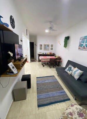 Living area - Férias Paraiso Praia Bandeira Verde (Jardim Las Palmas Guarujá)