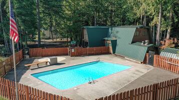 A seasonal community pool is available to guests, just a short walk from your cabin.
