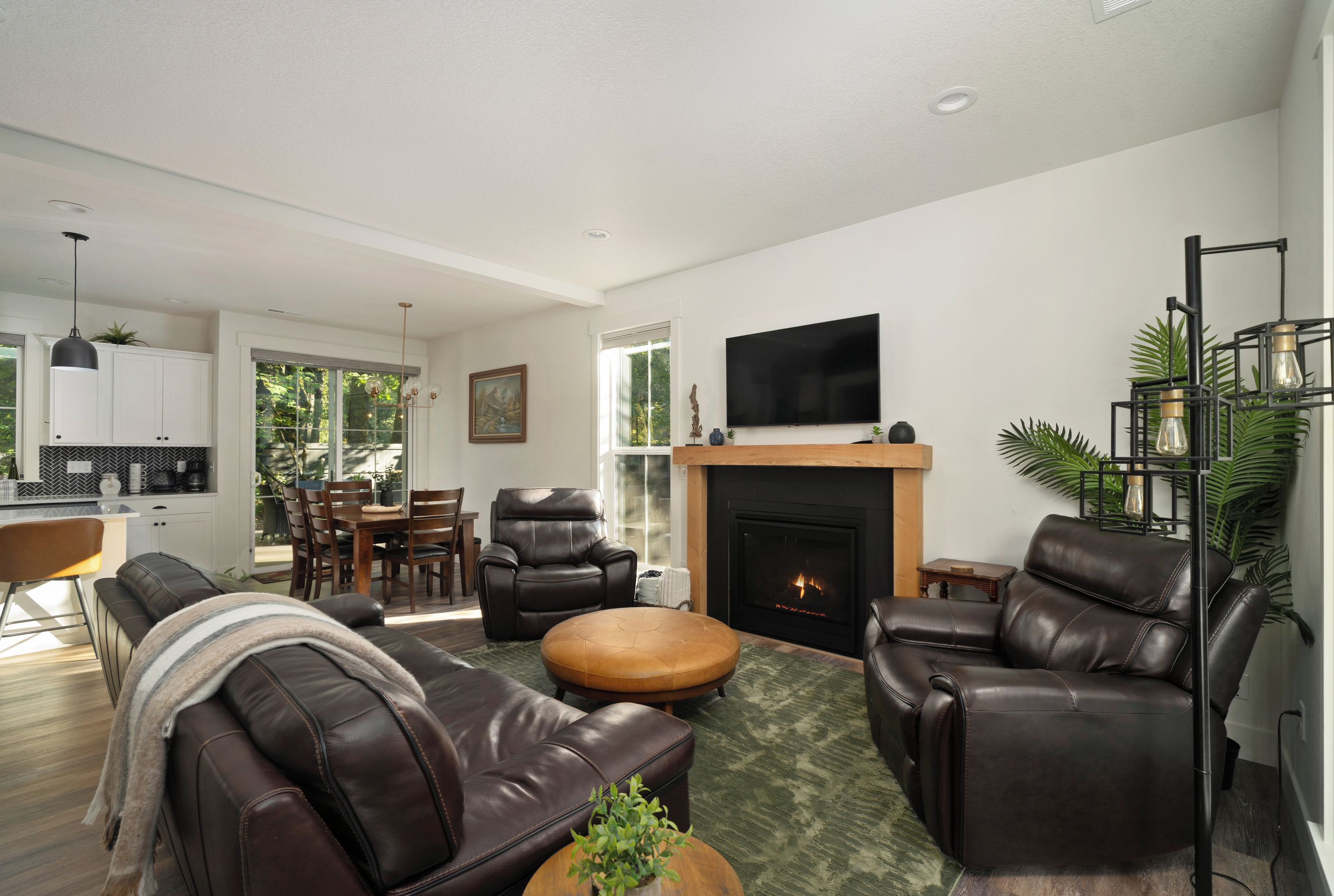 Curl up fireside in a cozy living room built for rainy PNW nights.